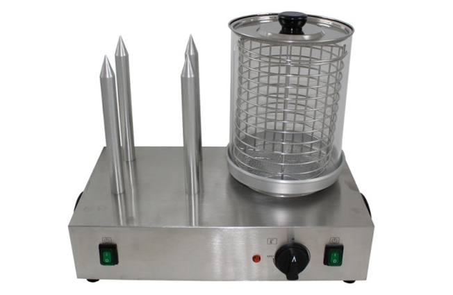 Machine à  hot dog professionnelle électrique , équipée de 4 plots inox chauffants et d'un cylindre en verre pour cuire à  la vapeur et maintenir les saucisses au chaud. 